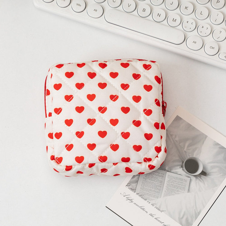 Heart-print travel toiletry pouch